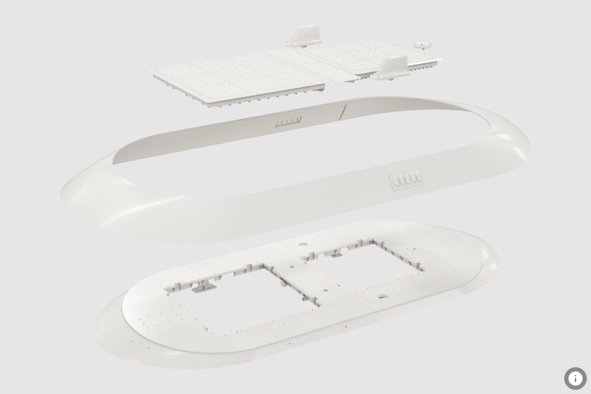 Exploded view of a component with three main sections separated and floating above each other